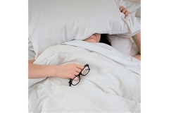 Image A ladying trying to sleep